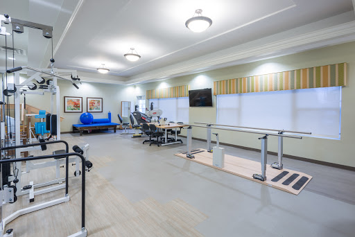 A spacious and well-equipped rehabilitation gym designed for fitness and therapy.