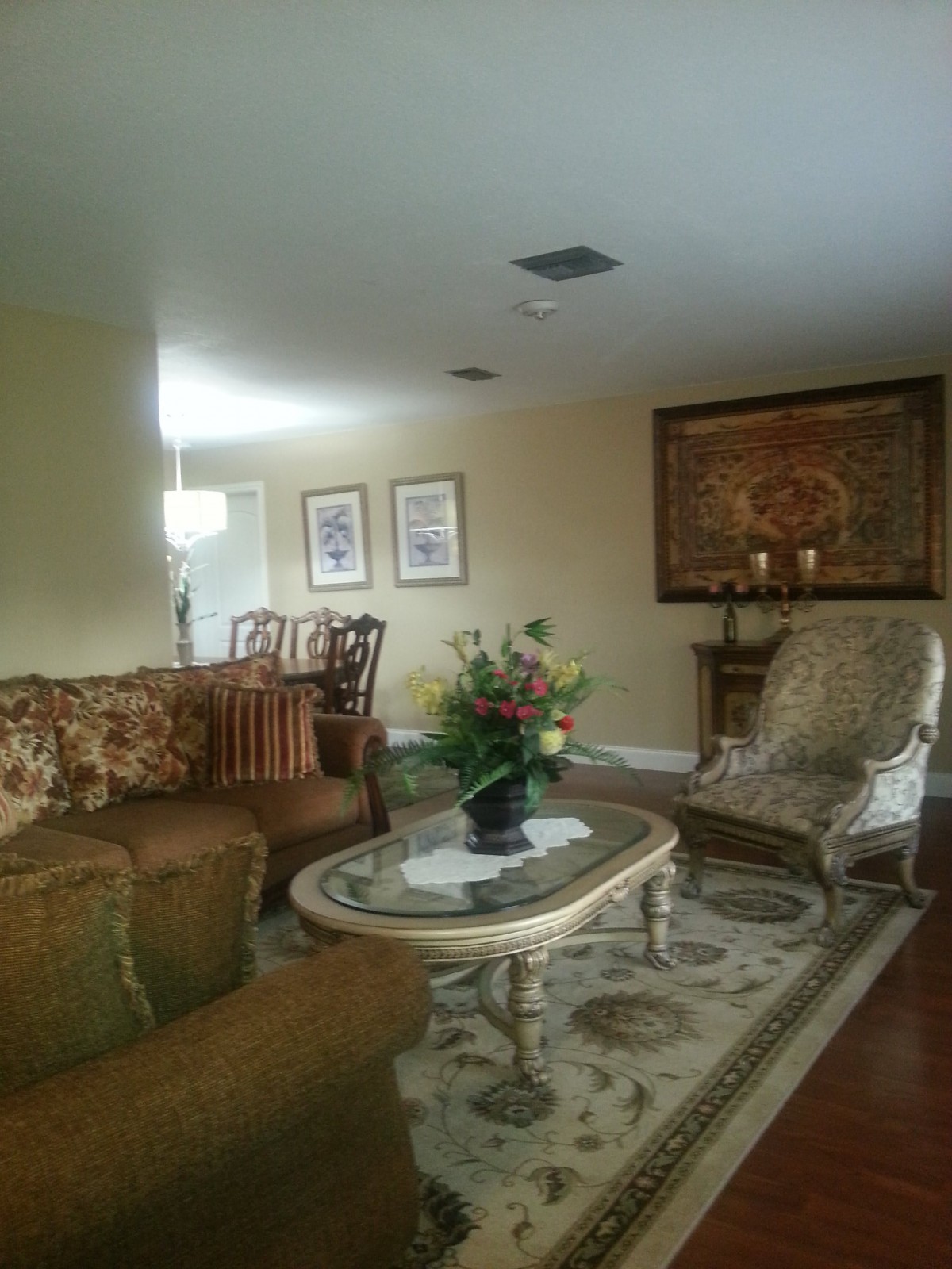 A cozy living room with classic furniture and elegant decor.