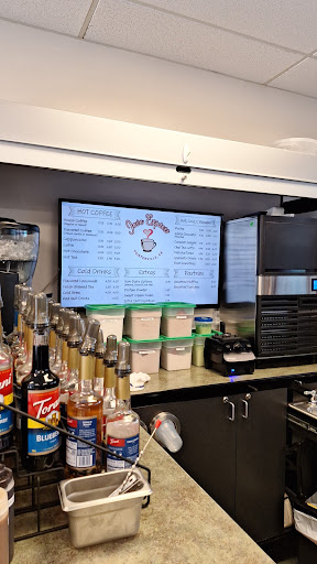 A view of a bar area showcasing a digital menu and various drink options.