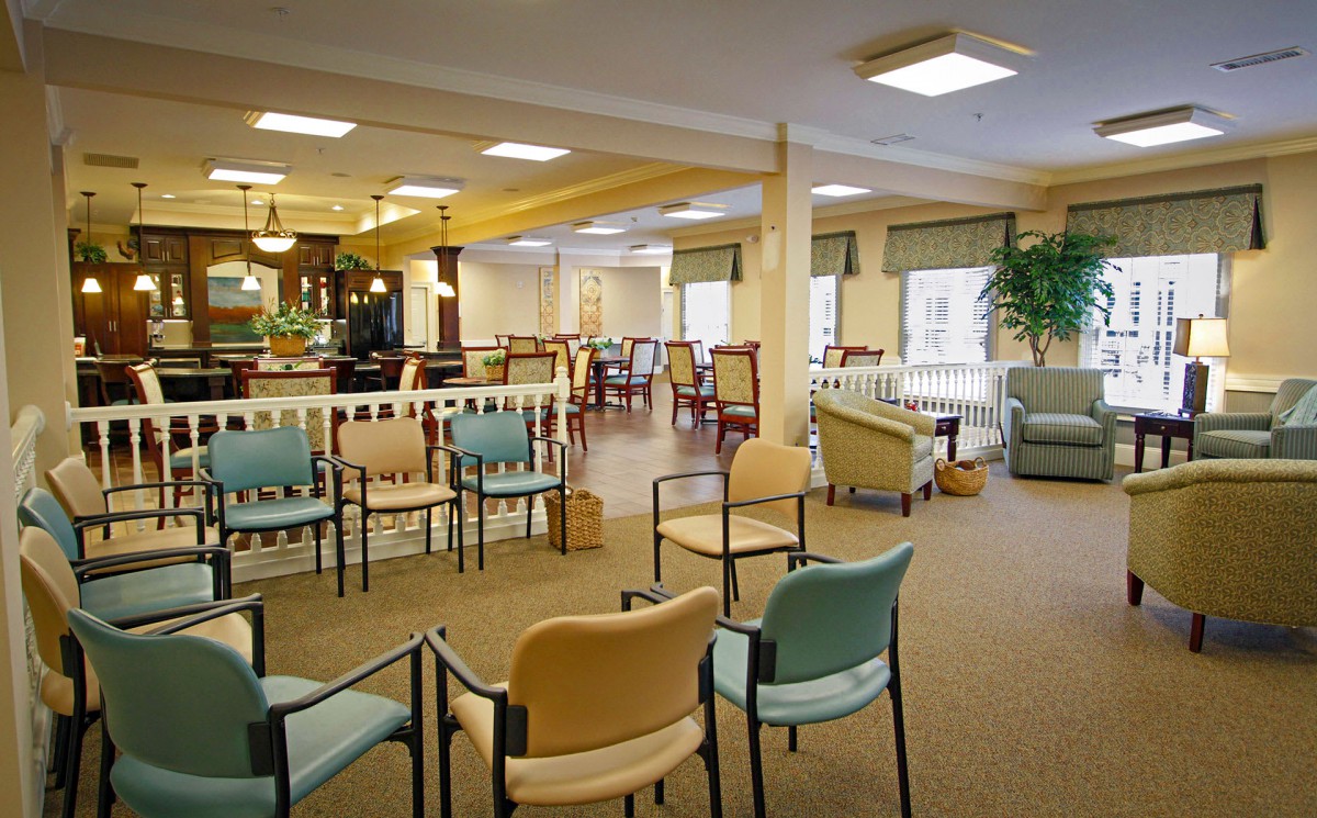 A spacious waiting area with arranged seating and bright lighting.