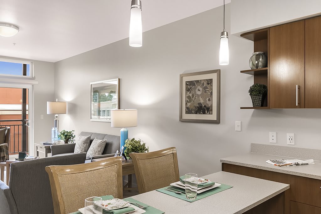 A modern dining area with stylish lighting and decor.