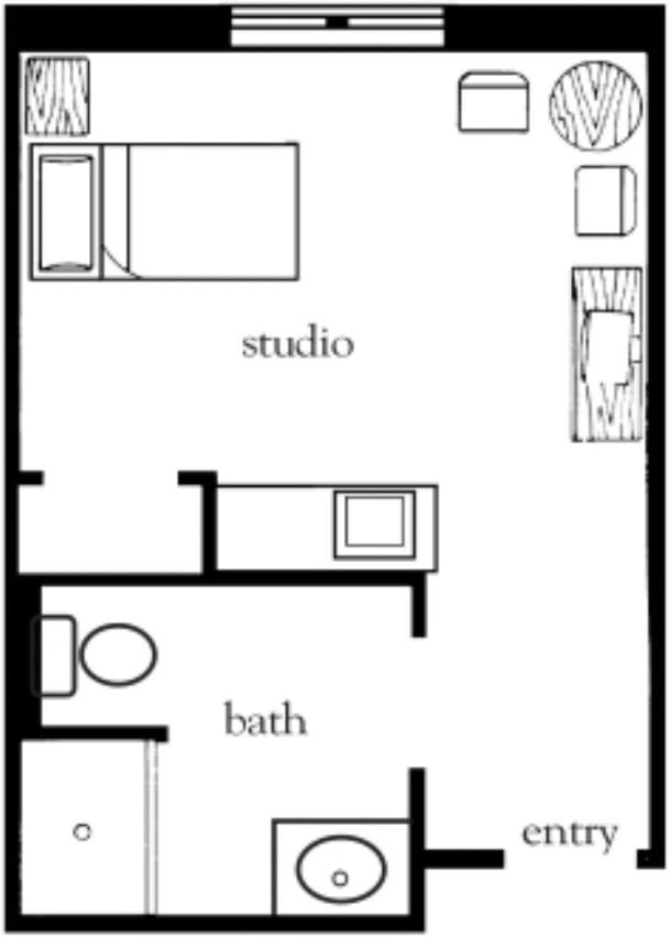 A floor plan layout of a studio apartment including a bed, bathroom, and seating area.