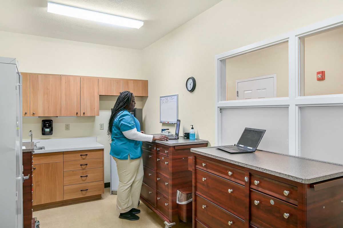 A healthcare professional in a medical clinic setting.