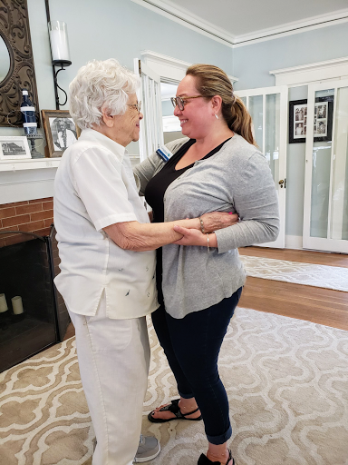 A beautiful moment of connection and joy as two people share a dance.