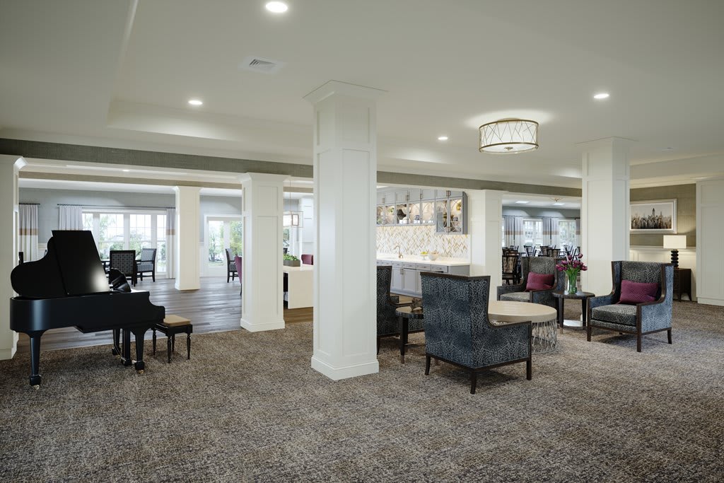 A modern lobby interior with comfortable seating and elegant lighting.