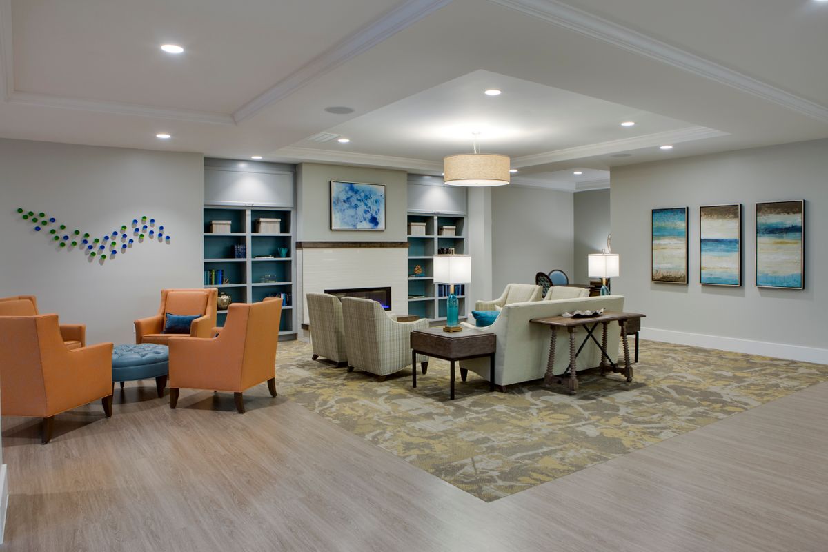 A modern living room with comfortable seating and tasteful decor.