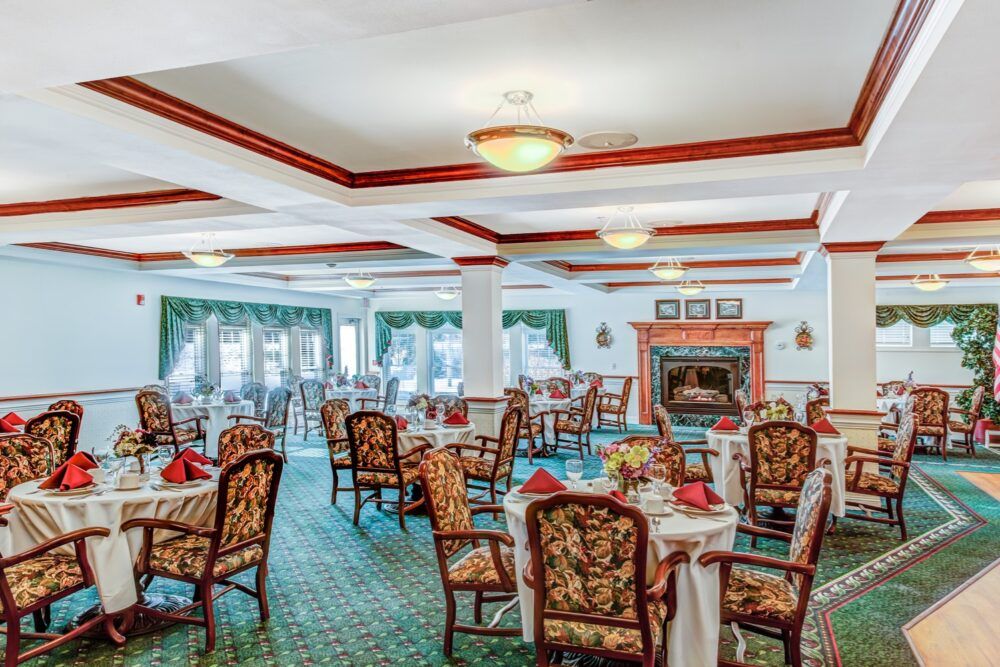 Elegant dining room with well-arranged tables and chairs.