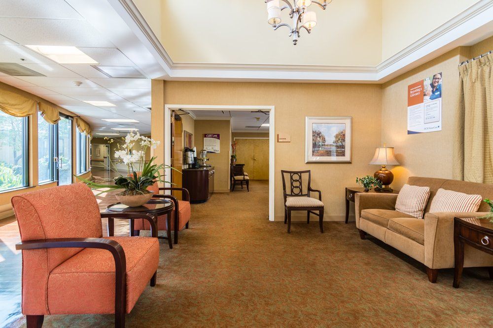 A well-furnished lobby area with comfortable seating and elegant decor.
