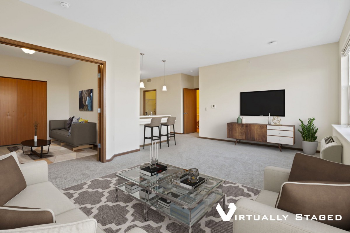 A modern living room with contemporary furnishings and a stylish decor.