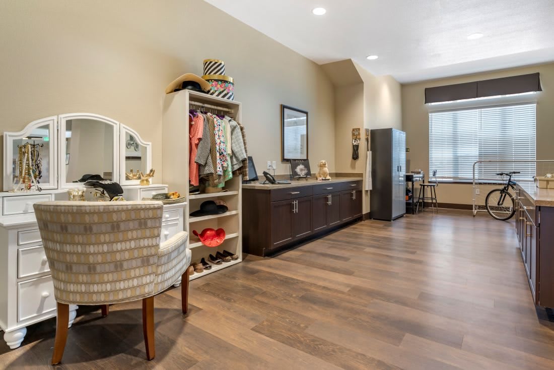 Spacious walk-in closet with ample storage and a dressing area.