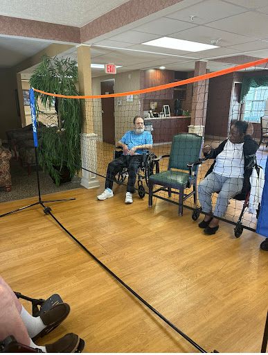 Residents participating in a recreational activity at a senior living facility.