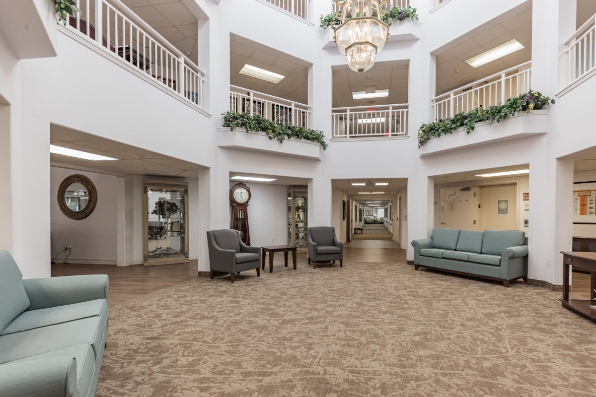 Spacious lobby with elegant decor and comfortable seating.