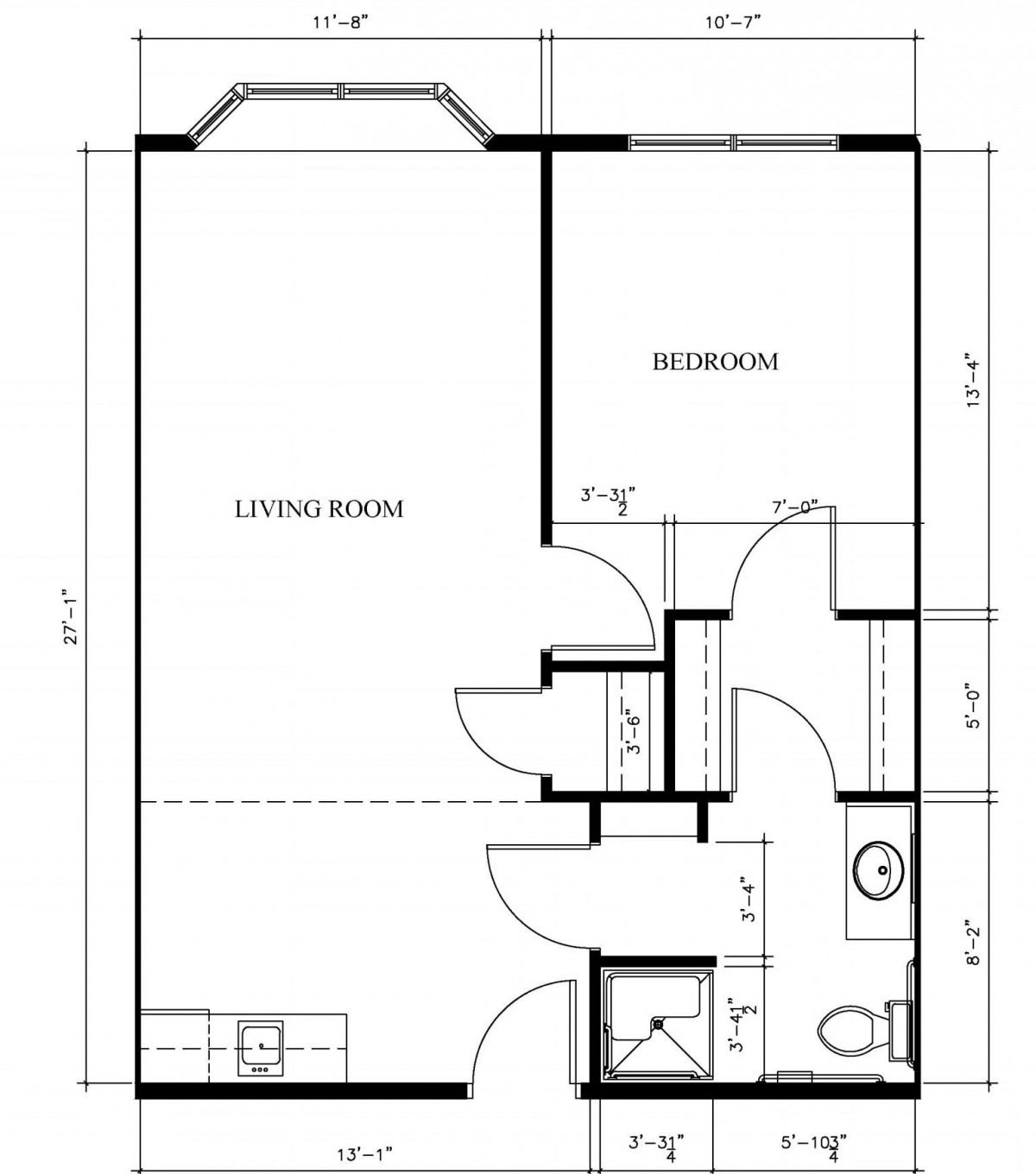 A simple floor plan featuring a living room, bedroom, and bathroom layout.