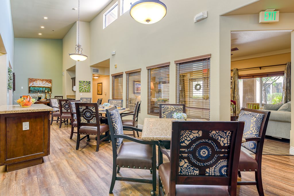 A spacious dining area with elegant decor and comfortable seating.