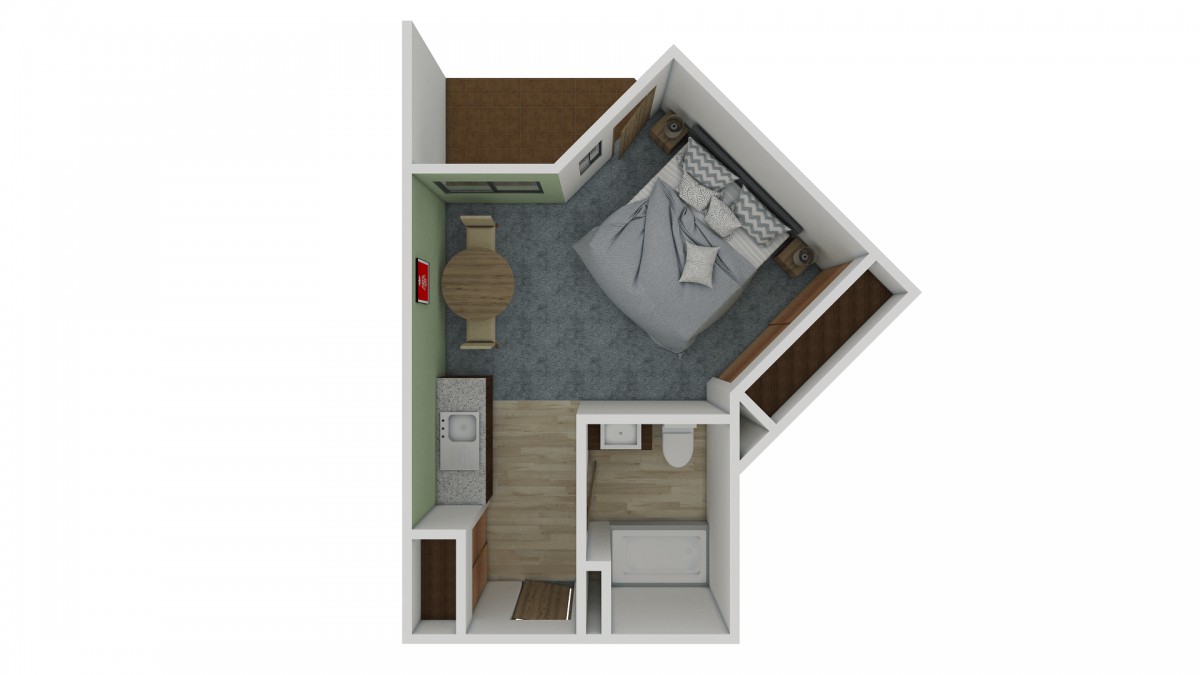 A compact apartment floor plan featuring a bedroom, kitchen, and bathroom.