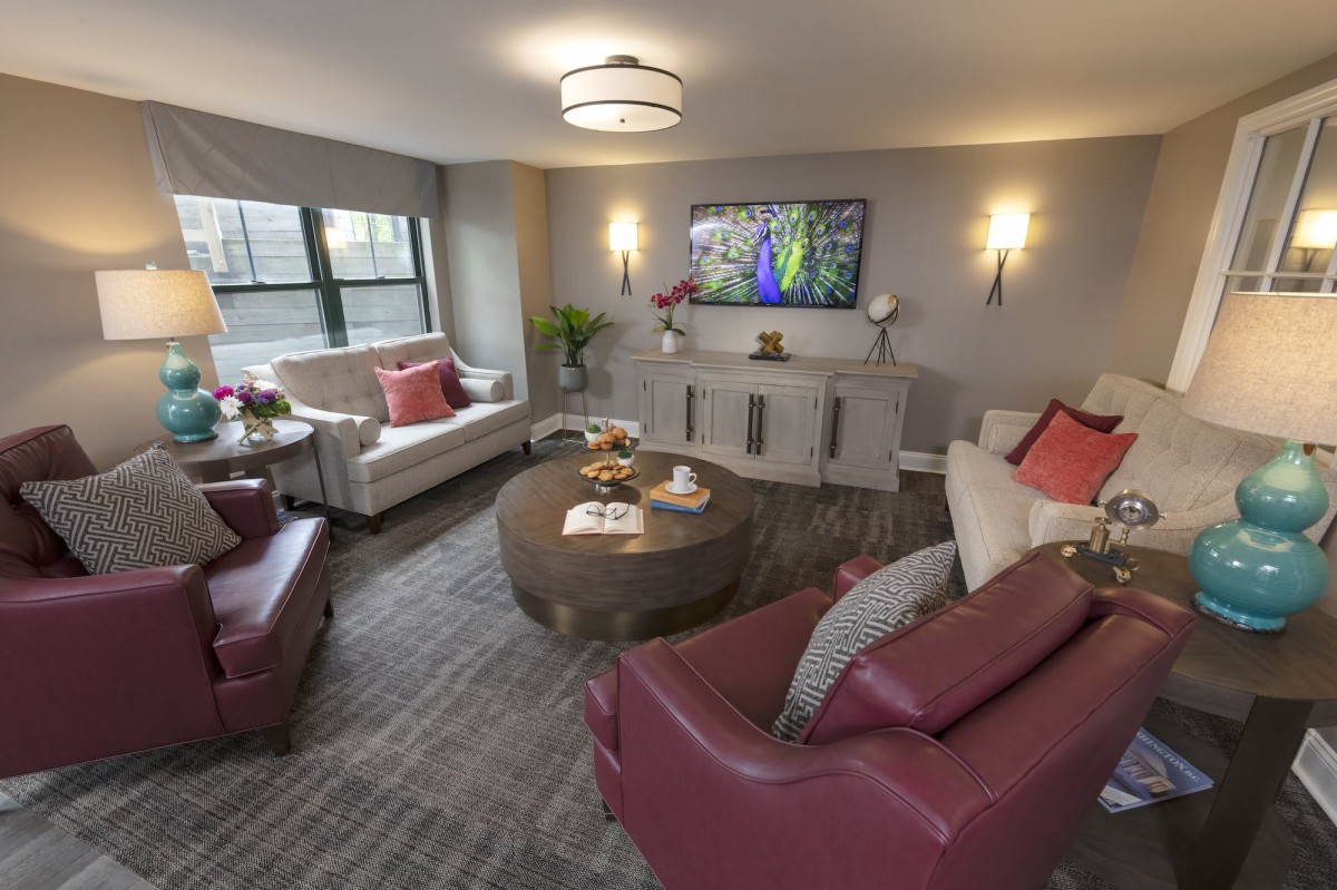 A modern living room with stylish furniture and decor.