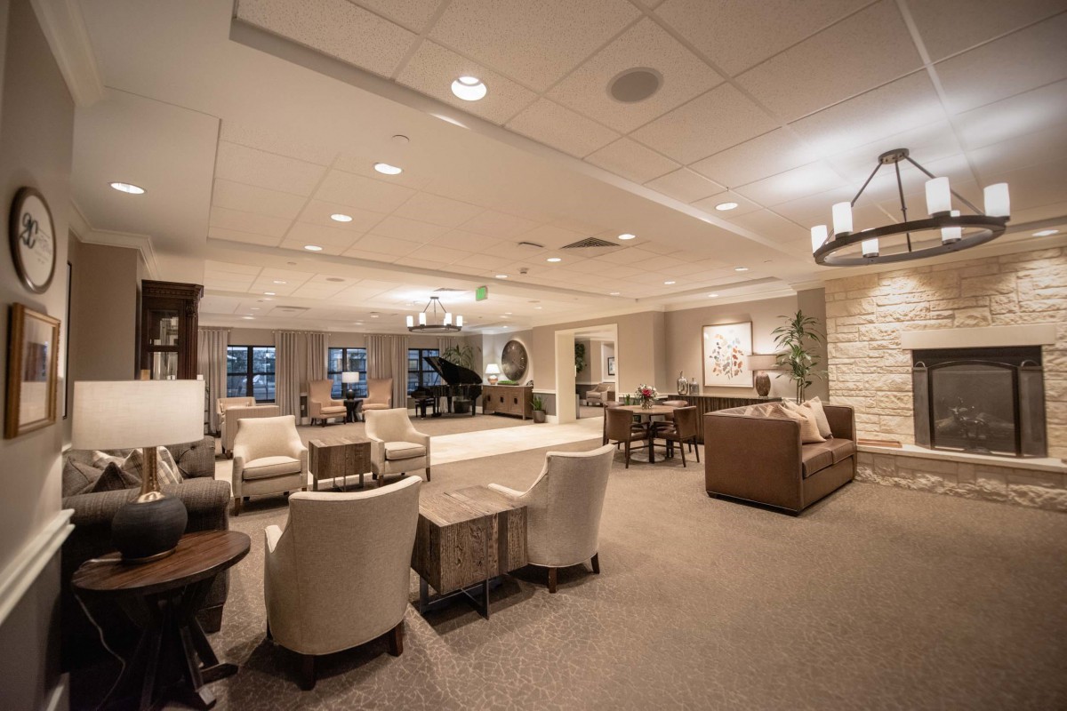 A spacious and elegantly decorated living room with comfortable seating and modern decor.