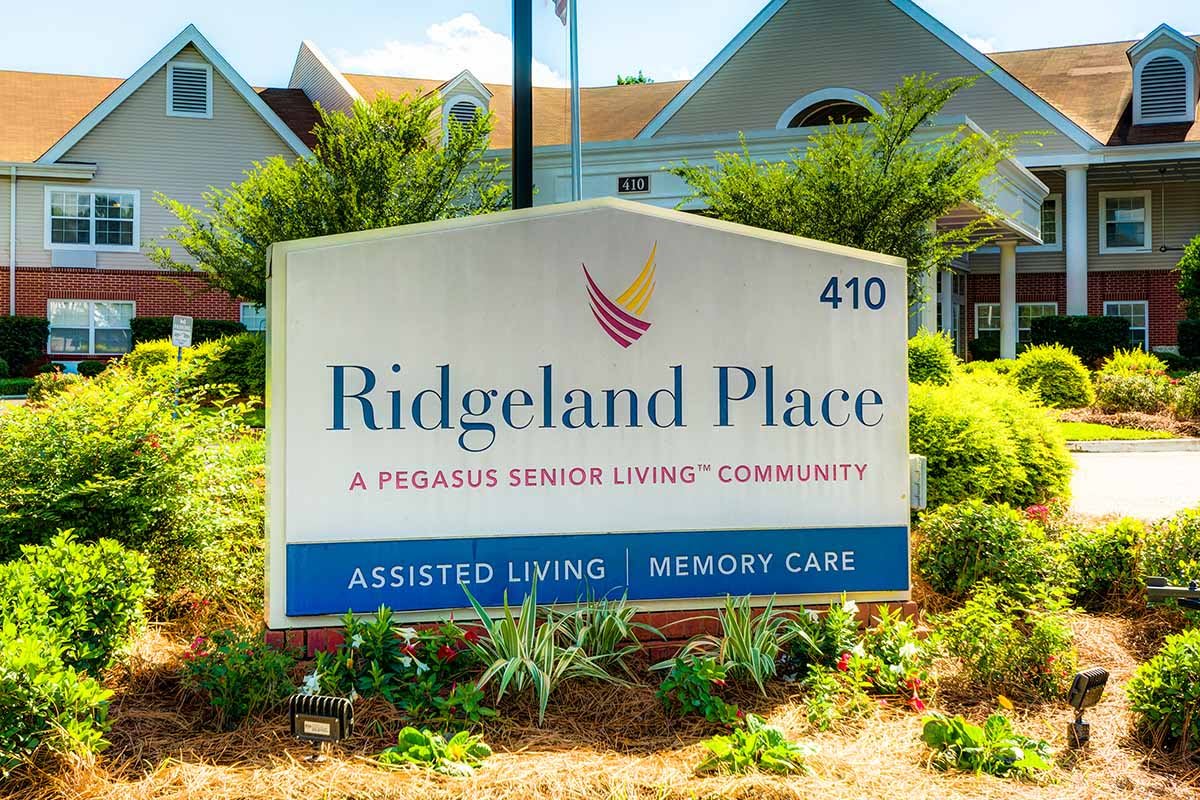 Sign for Ridgeland Place, an assisted living and memory care community.
