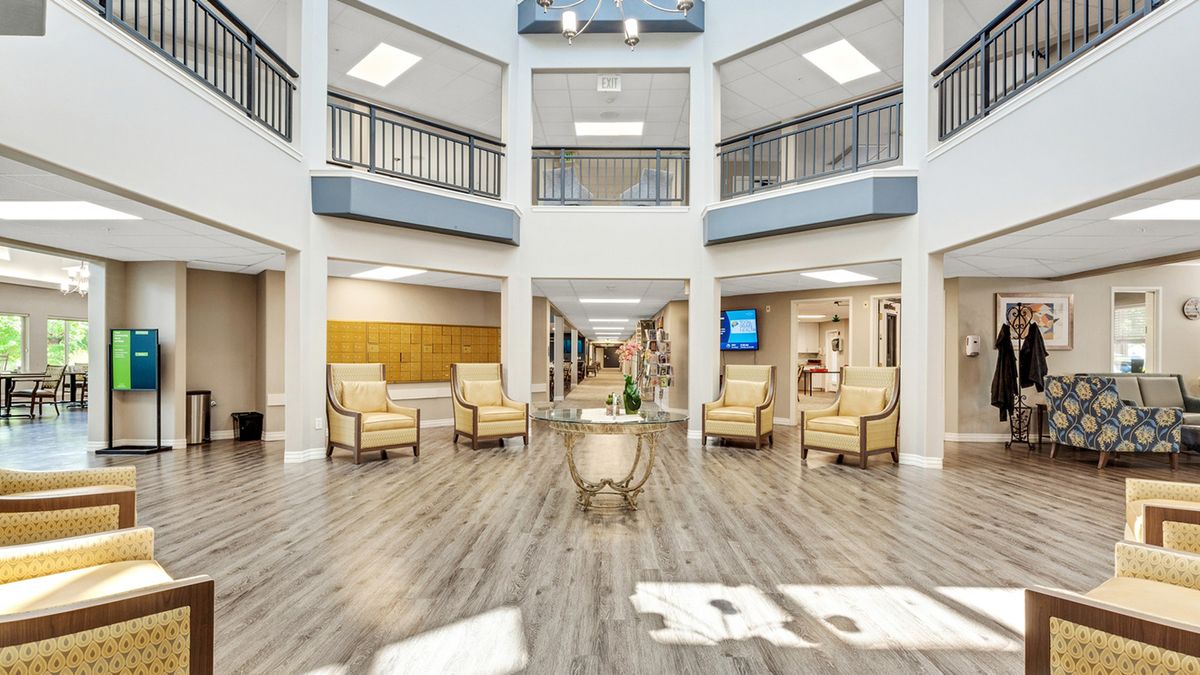 A spacious and modern lobby with comfortable seating and bright lighting.