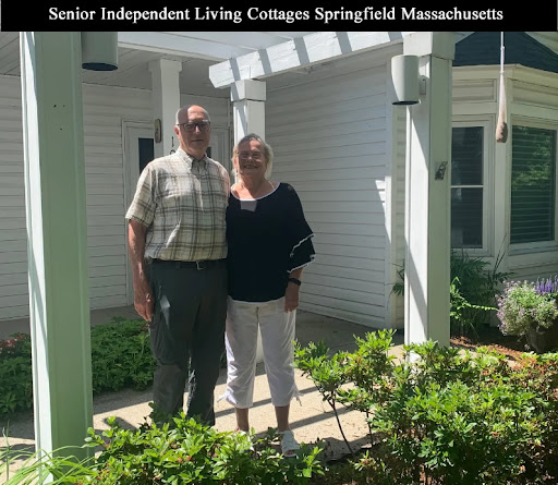 A couple poses together at a senior independent living cottage in Springfield, Massachusetts.