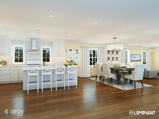 A beautifully designed open-concept kitchen and dining area featuring modern aesthetics and warm wooden floors.