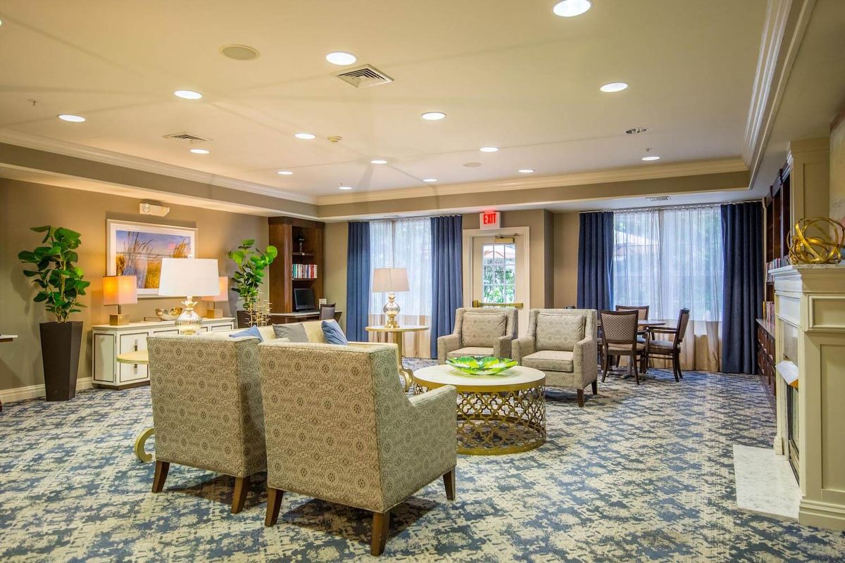 A cozy lobby area with comfortable seating and elegant decor.