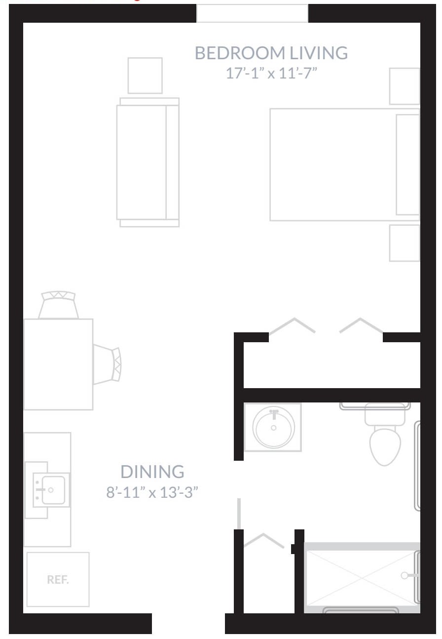 A floor plan layout of an apartment featuring a kitchen, dining area, living space, and bathroom.