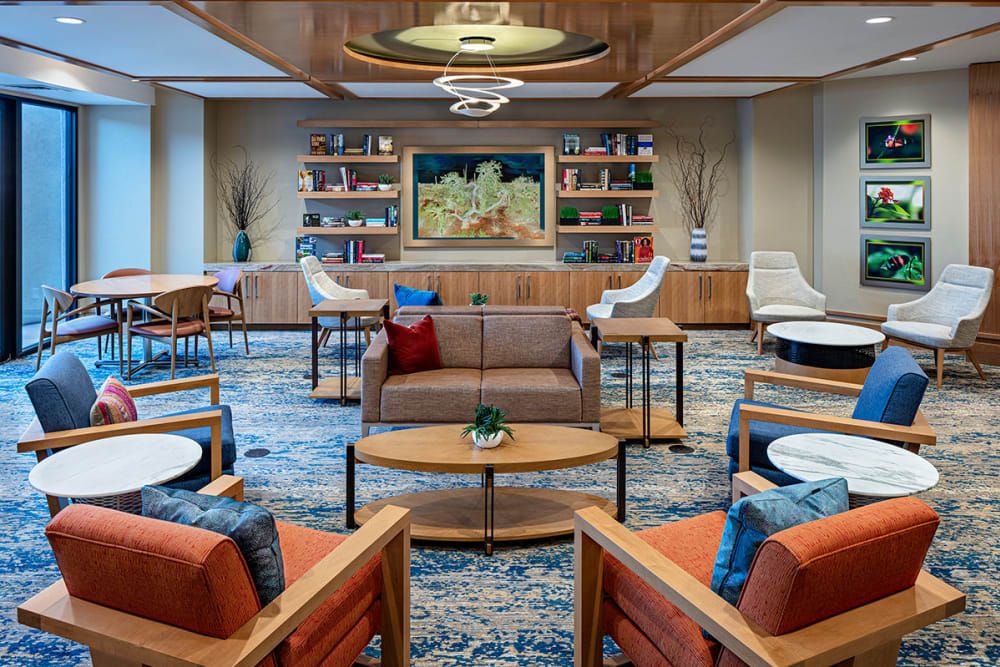 A modern lounge with comfortable seating and stylish decor.
