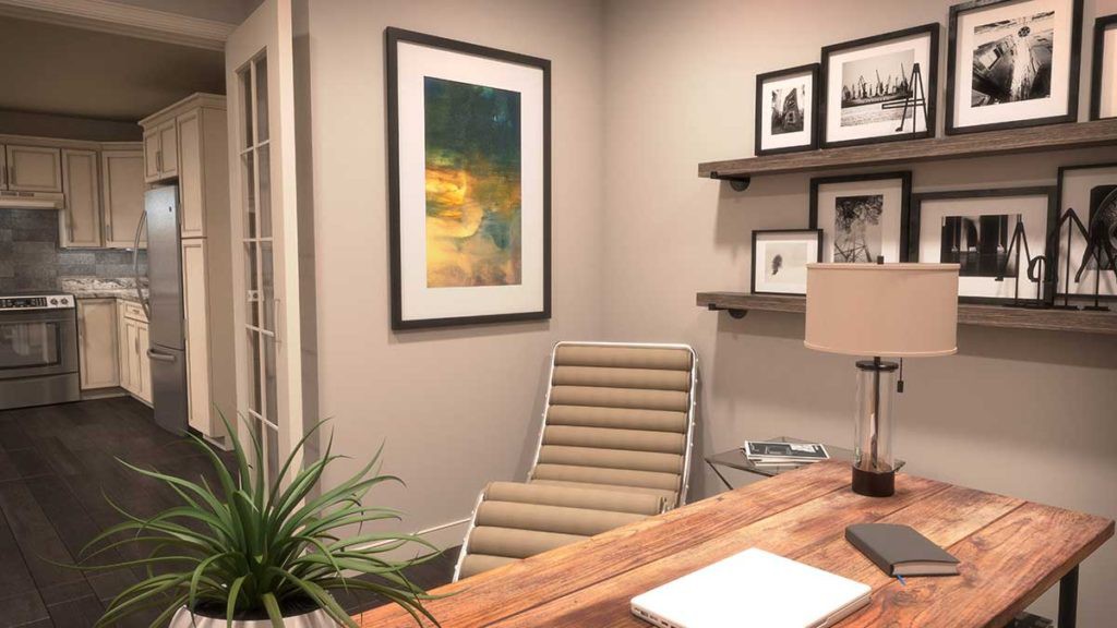 A cozy home office with a modern chair and wooden desk, featuring decorative artwork and shelves.