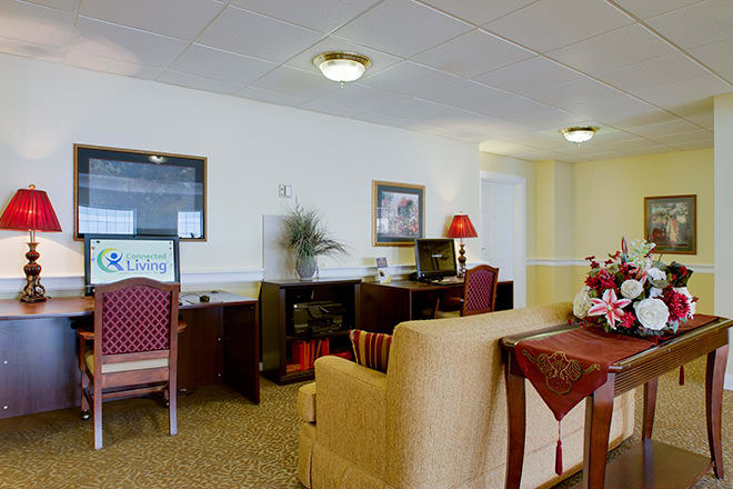 A neatly organized office space with furniture and decor.