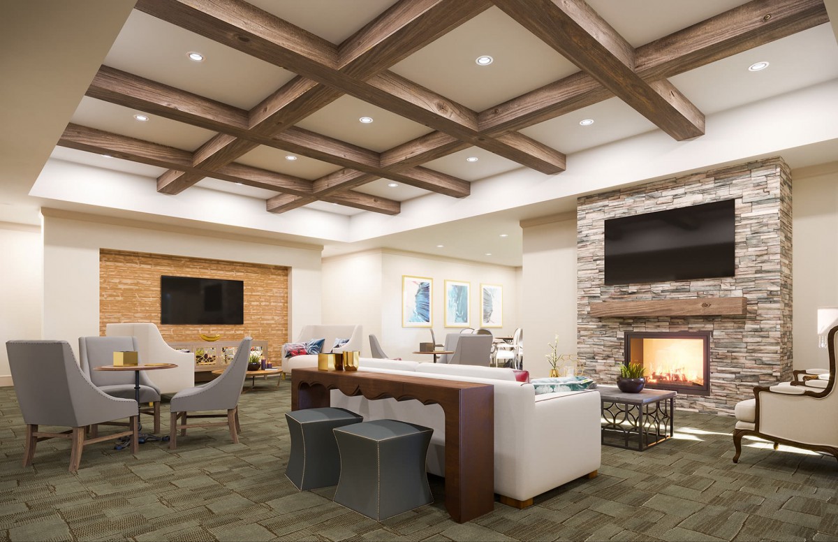 A modern living room with a cozy fireplace and stylish seating area.