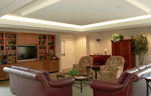A cozy living room featuring comfortable seating and a television.