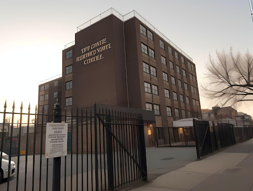 A community center building, showcasing urban architecture at dusk.