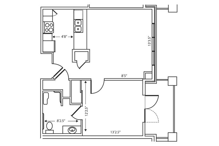 A floor plan of a one-bedroom apartment showing the kitchen, bathroom, and living area.