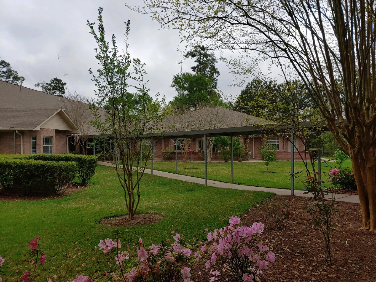 A suburban home with a well-maintained garden and pathway.