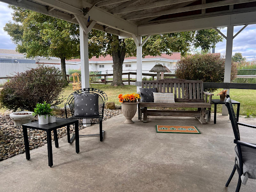 A cozy outdoor seating area perfect for enjoying a peaceful moment.