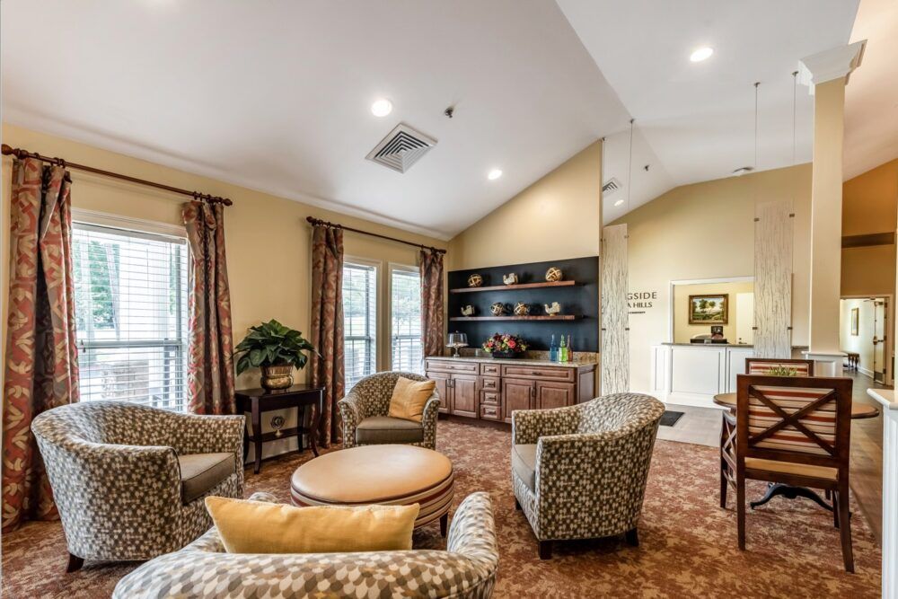 A cozy living room with comfortable seating and elegant decor.