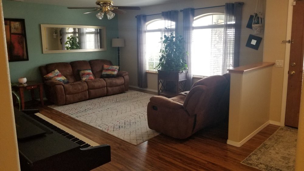 A cozy living room with comfortable seating and natural light.