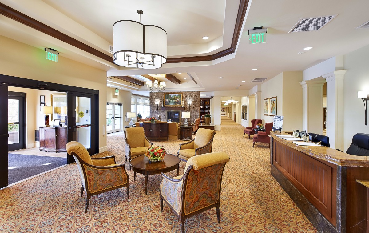 A cozy lobby with comfortable seating and elegant lighting.