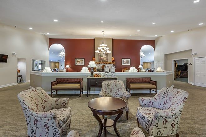 A well-furnished lobby with comfortable seating and elegant decor.