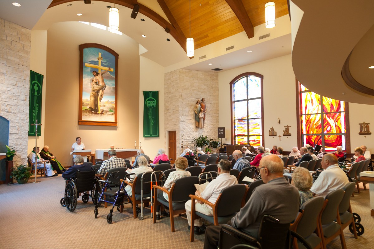 A congregation gathered inside a church for a worship service.