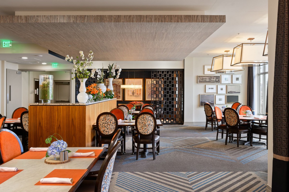 A beautifully decorated restaurant interior with neatly arranged tables and stylish decor.