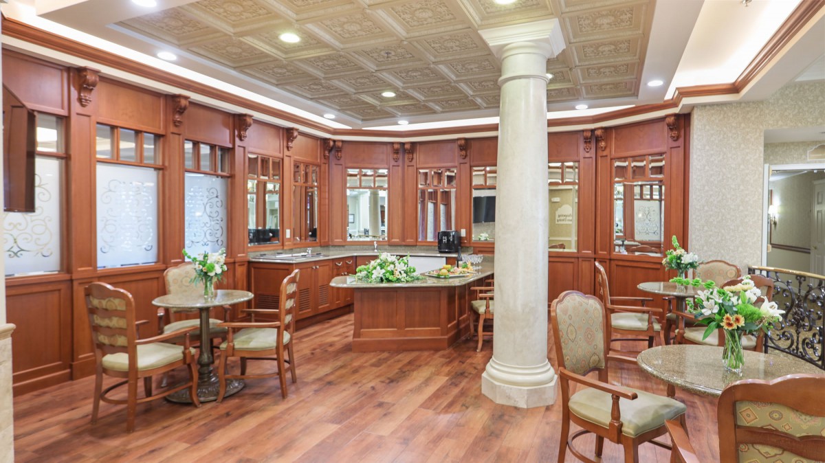 Elegant interior with luxurious wood paneling and furniture.