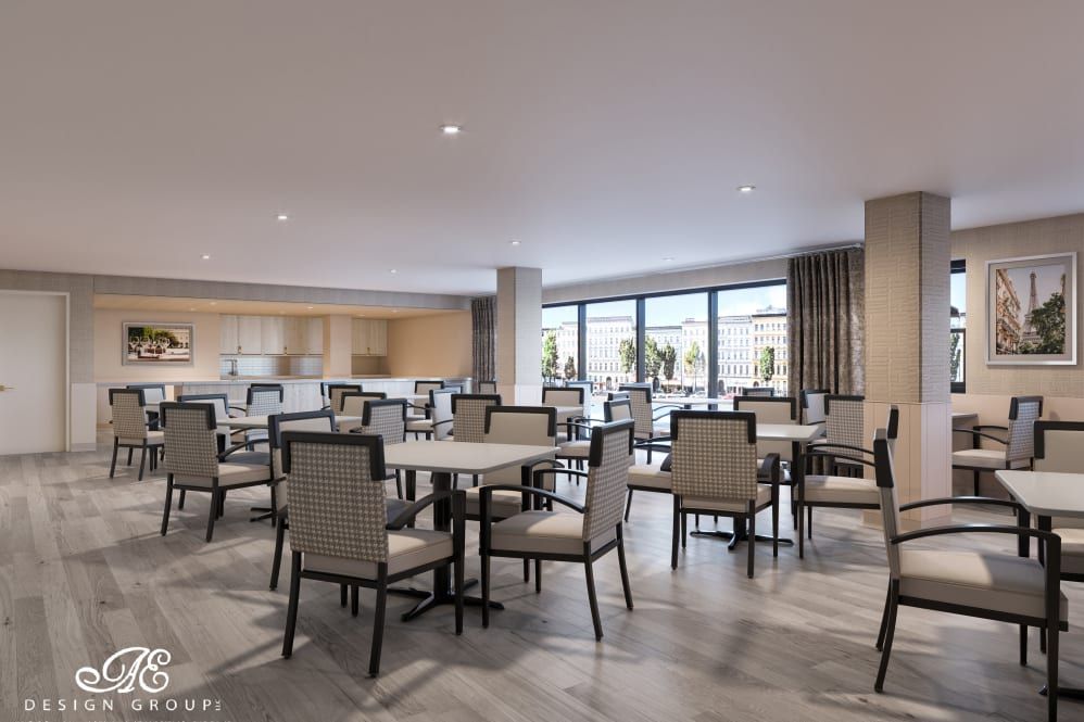 A modern dining area with neatly arranged tables and chairs.