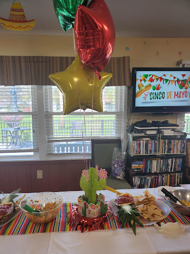A vibrant setup for a festive gathering filled with delicious snacks and cheerful decorations.