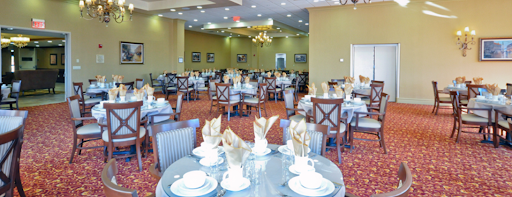 A spacious and elegantly arranged dining room, ready for guests.