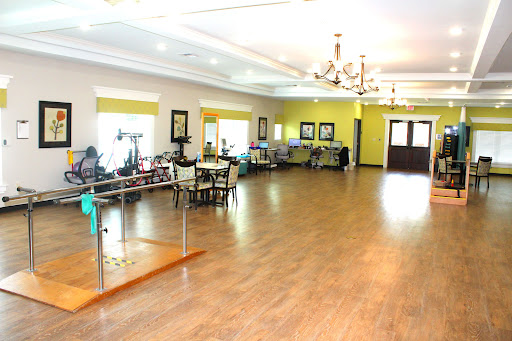 A spacious and elegantly designed lobby area featuring comfortable seating and decorative elements.