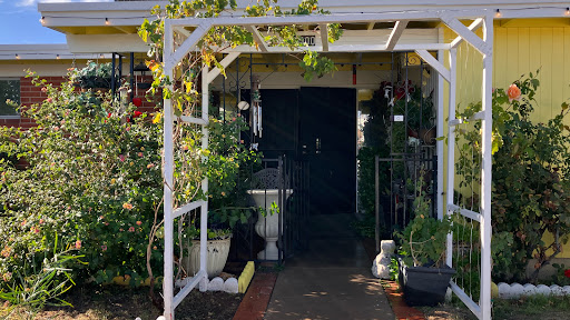 A welcoming entrance adorned with greenery.