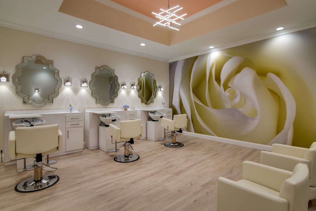 Modern and elegant beauty salon interior with stylish decor and lighting.
