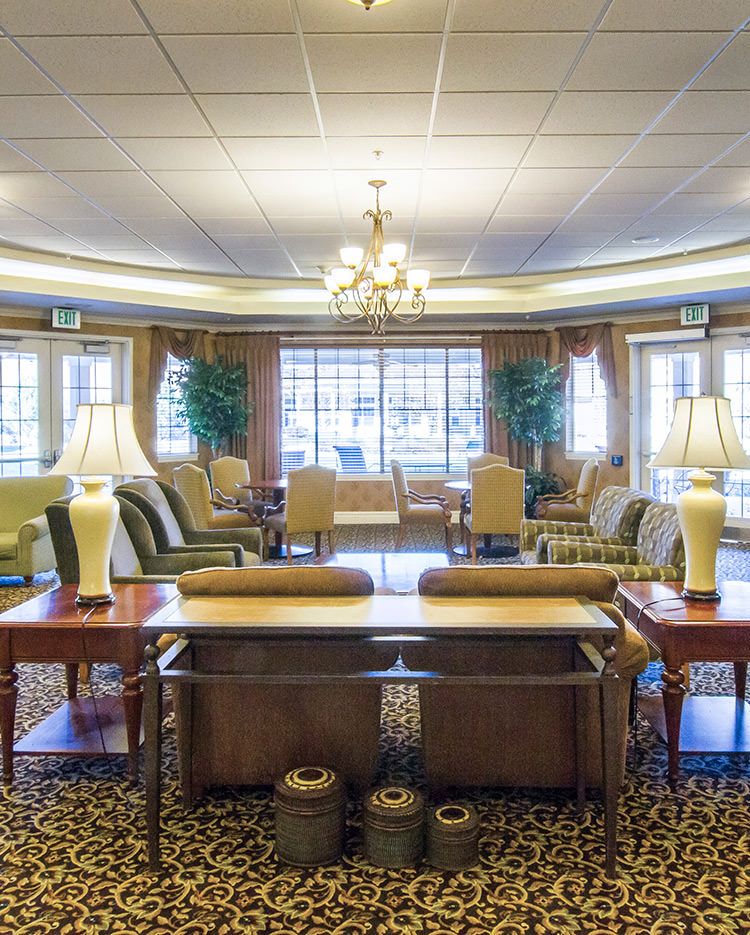 A spacious and elegantly designed lobby with comfortable seating and warm lighting.
